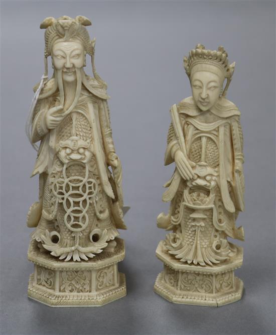 A pair of Cantonese ivory chess pieces, King and Queen height 12cm